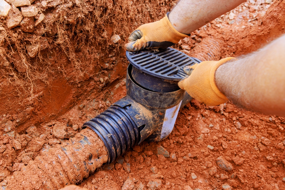 Damaged,drainage,system,for,collecting,rainwater,requires,replacement,of,underground