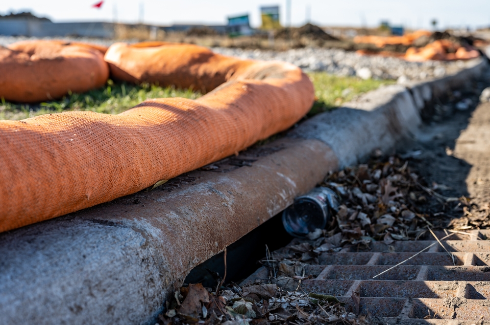 Filter,sock,placed,to,prevent,erosion,runoff,of,soil,into